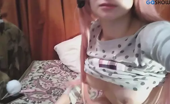 PinkHaired Girl Playing with Her Dildo and Spreading Legs